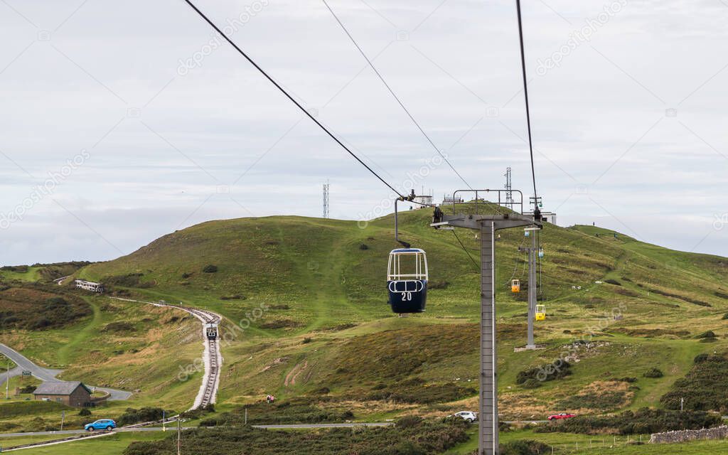 Cable cars on the Great Orme as the famous trams prepare to pass one another below on the North Wales coast in October 2021.