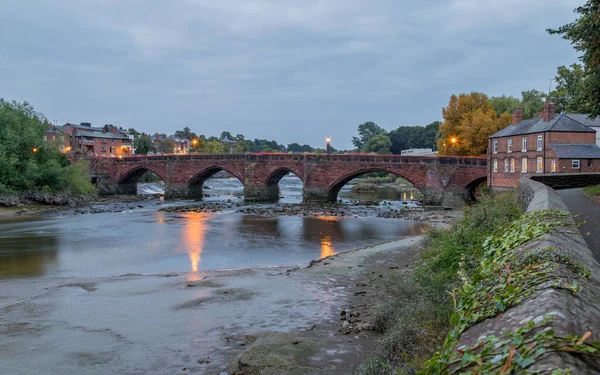 Red traffic trails seen over the Old Dee Bridge in chester one evening in September 2021 before sunset.