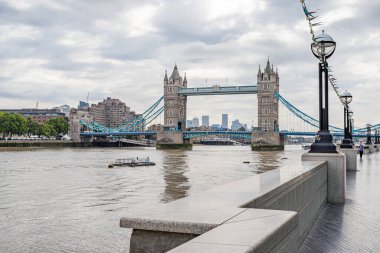 The iconic Tower Bridge in London captured spanning the River Thames from the Queens Walk in August 2022.