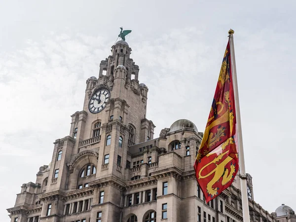 Royal arms of England in front of the Royal Liver Building on the Liverpool waterfront captured in September 2022 two days after Queen Elizabeth II passed away.