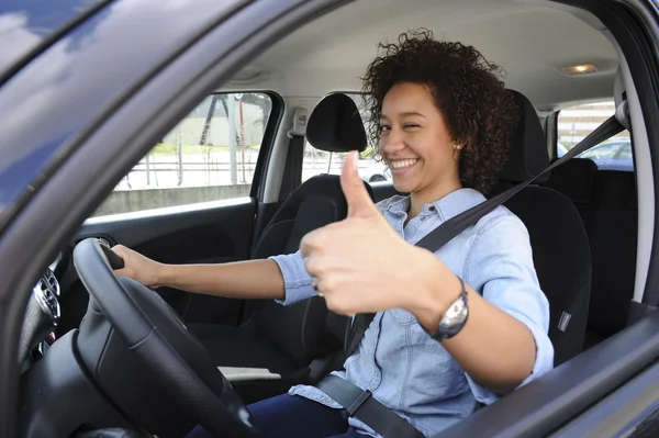 Young woman driving a car — Stock Photo, Image