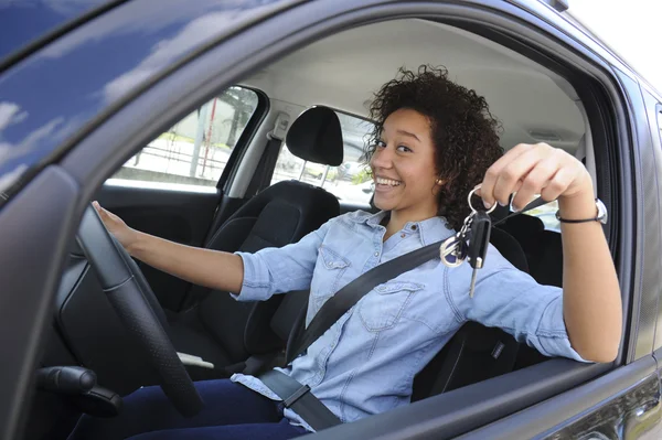 Young woman driving a car — Stock Photo, Image