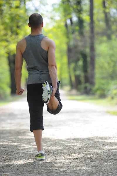 Stretching-man-sport en fitness — Stockfoto