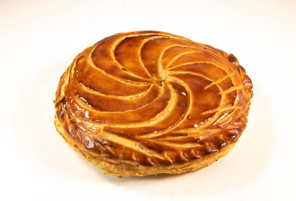 Galette des rois on wooden table, Traditional Epiphany cake in France — Fotografie, imagine de stoc