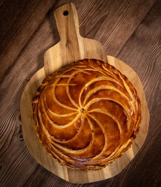 Galette des rois on wooden table, Traditional Epiphany cake in France — 스톡 사진