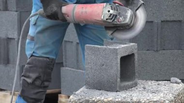 Concrete floor cutting, cinder block with a grinder
