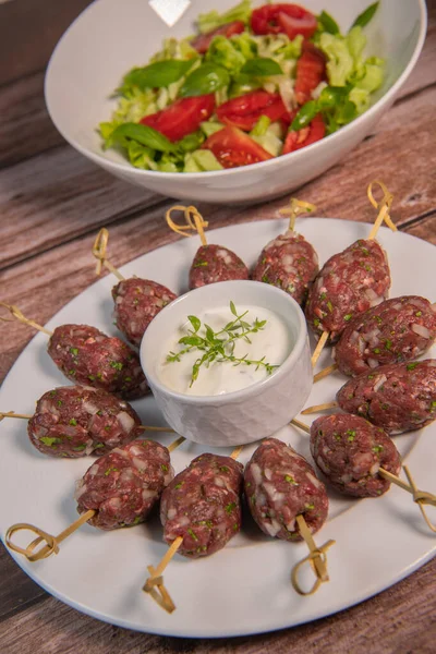Traditional homemade kefta or kebab of meat. Halal concept. Arabic and Liban food. High quality photo