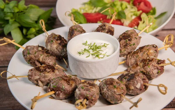 Traditional homemade kefta or kebab of meat. Halal concept. Arabic and Liban food. High quality photo