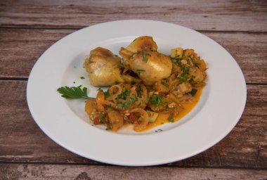 Delicious chicken with oven-roasted ratatouille vegetables. High quality photo
