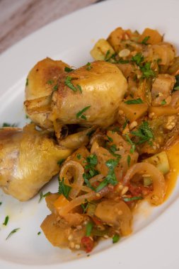 Delicious chicken with oven-roasted ratatouille vegetables. High quality photo