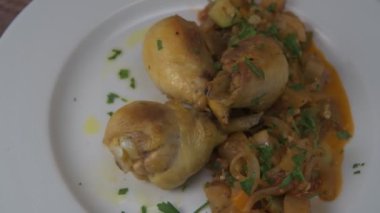 Delicious chicken with oven-roasted ratatouille vegetables on turntable, High quality photo