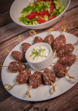 Recipe of kefta, beef skewer, Traditional homemade, with Greek yoghurt sauce, garlic, savory, Arabic and Libanese food, High quality photo
