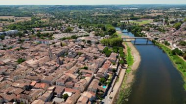 Aerial view of Sainte Foy la Grande and Dordogne river, Gironde, France. High quality video