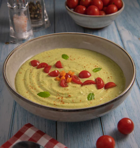 Vegan recipe for cucumber and courgette gazpacho with tomatoes. High quality photo
