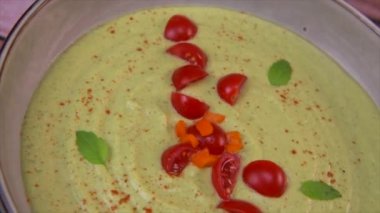 Vegan recipe for cucumber and courgette gazpacho with tomatoes. High quality video
