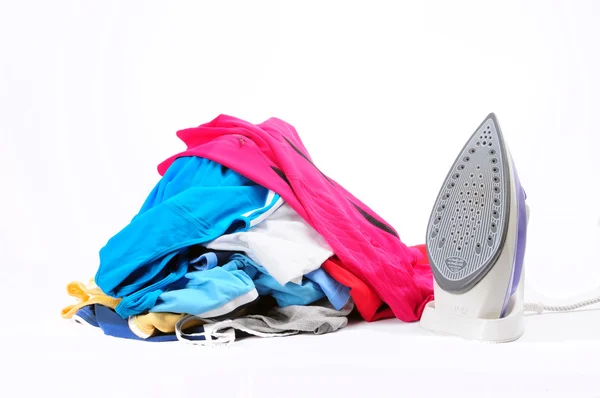 Iron and Folded Clothing — Stock Photo, Image