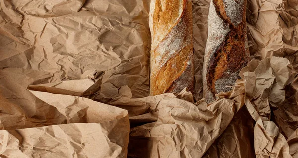 Wrapped Two Loaves Crumpled Paper Culinary Background — Foto Stock