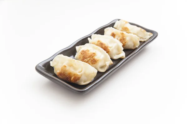 Dumplings japoneses con fondo blanco —  Fotos de Stock