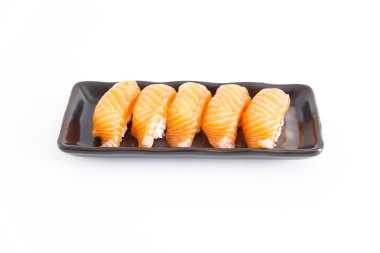 Beyaz arka planı olan suşi.