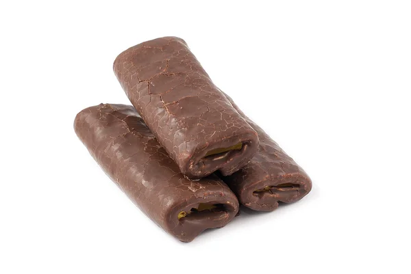 Tiges de crème pâtissière farcie et trempé dans le chocolat isolé — Photo