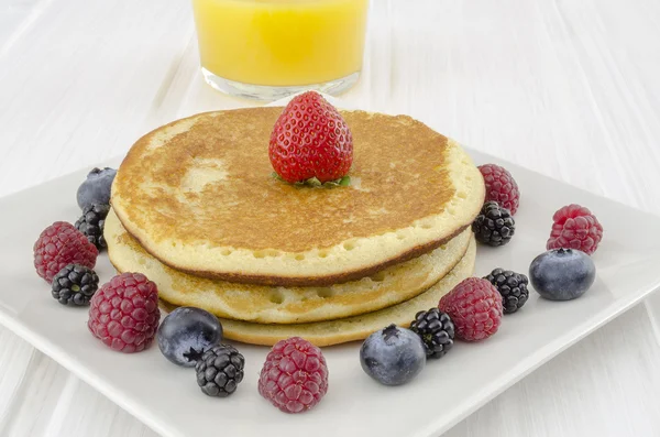 Breakfast table with pancakes — Stock Photo, Image