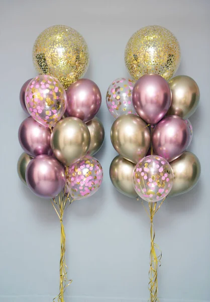 Altın ve pembe balonlar, bir kız için büyük bir helyum balonu seti.