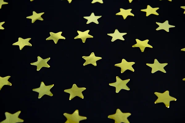 Estrelas Douradas Sobre Fundo Preto — Fotografia de Stock