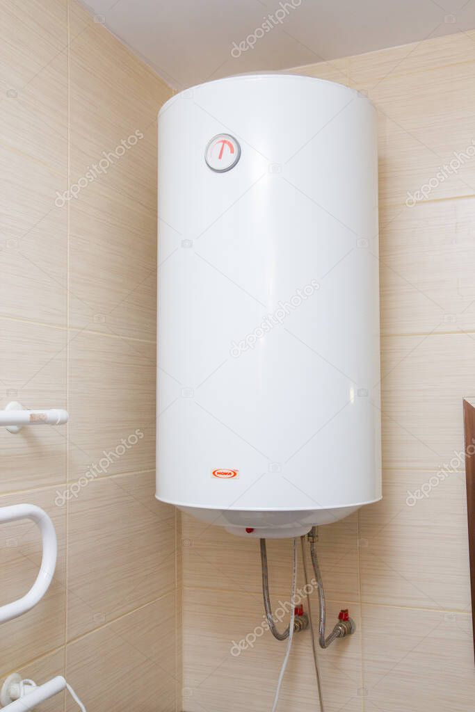 white water heater in the bathroom