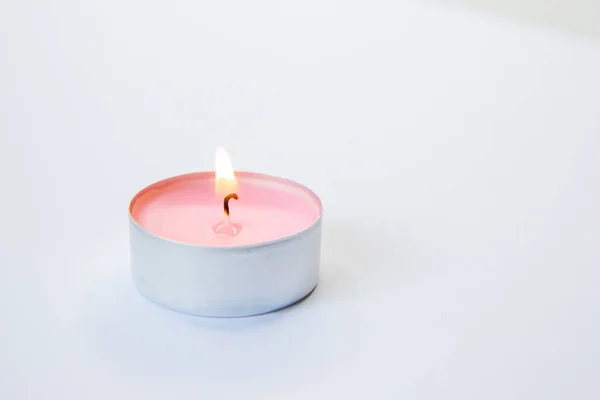 Burning Pink Candle Pink Background — 图库照片
