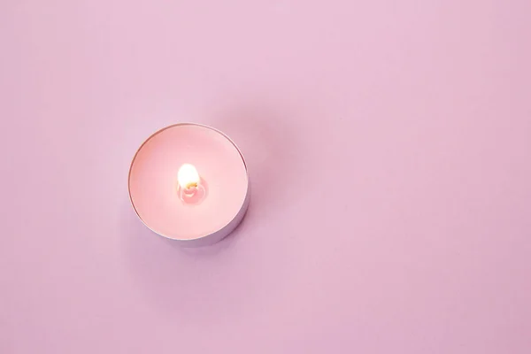 Burning Pink Candle Pink Background — 图库照片