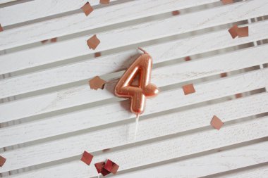 candle number 4 in the cake