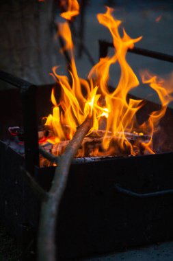 cooking camp on grill at summer time at sunset.