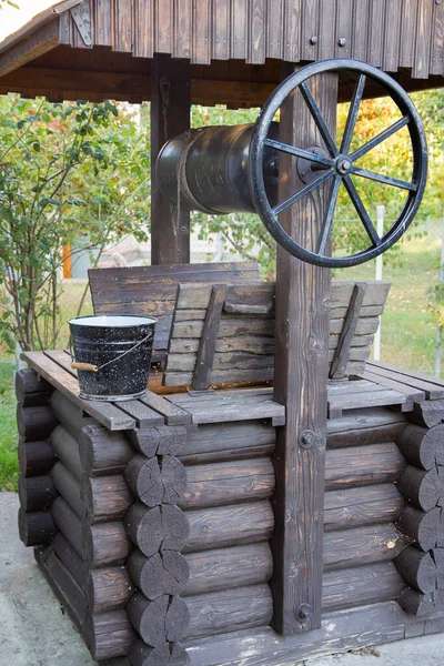 Rural Wooden Well Black Bucket Water — Stockfoto