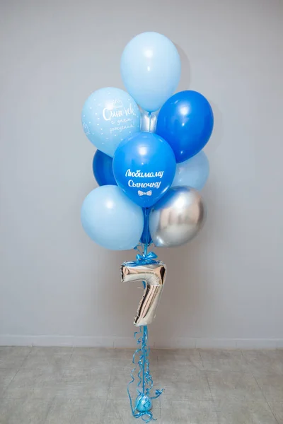 a set of blue and blue birthday balloons, inscriptions on the balloons \