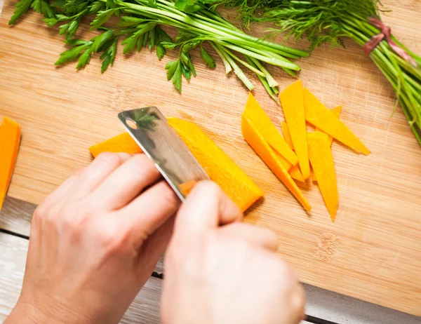 Cutting Carrots — Stock Photo, Image