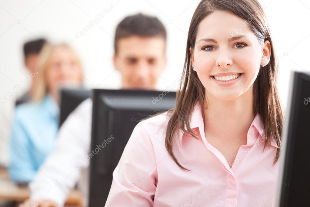 Smiling Student Using Computer