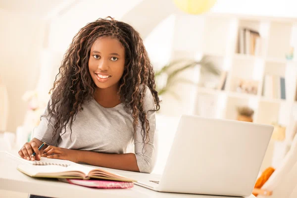 Teenage Girl Doing Homework Stock Image