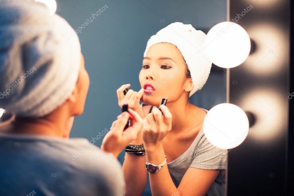 Woman Applying Make-Up