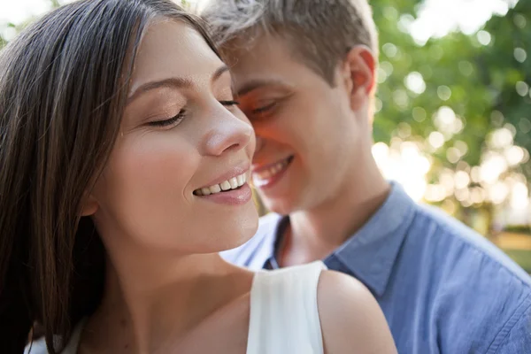 Happy Couple Smiling Outdoors Stock Photo