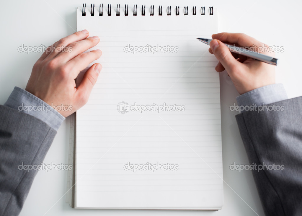 Businessman and a Blank Notepad