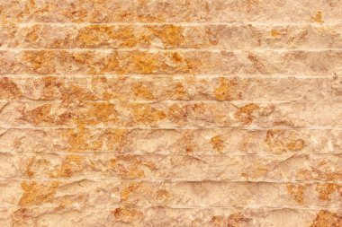 Bej rengi kırık tuğla duvar grunge arkaplan dokusu