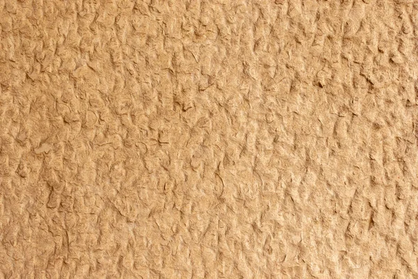 Beżowy papier rzemieślniczy teksturowane tło lub tapety — Zdjęcie stockowe