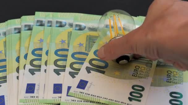 Saving Money Led Bulb Euro Money — Vídeo de Stock