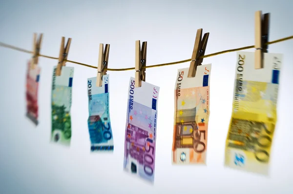 Euro notes hanging on a clotheslin — Stock Photo, Image