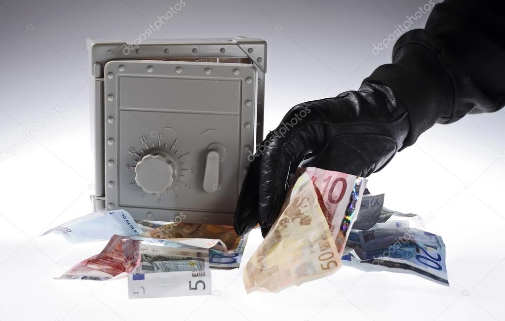 Thief grabbing money