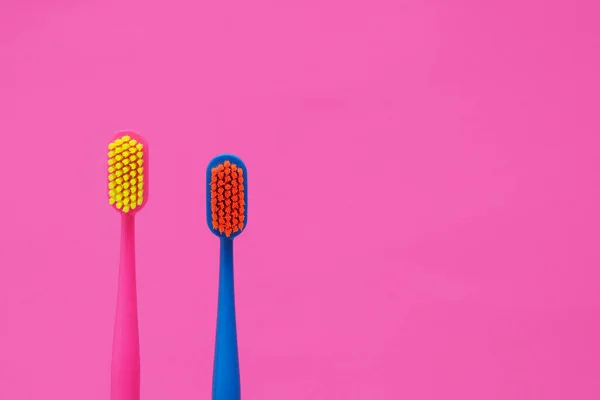 Two Multi Colored Toothbrushes Pink Background Copy Space — Stock Photo, Image