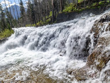 Wide waterfall in the mountains of Montana 