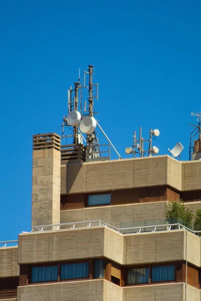 Group Telecommunications Antennas Building Roof — Stok fotoğraf