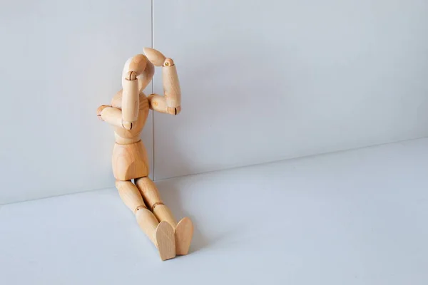 Concept Despair Regret Wooden Doll His Hands His Head — Stok fotoğraf