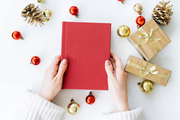 Red Book Hands Young Girl Background Gifts Christmas Toys Concept — Stock Photo, Image